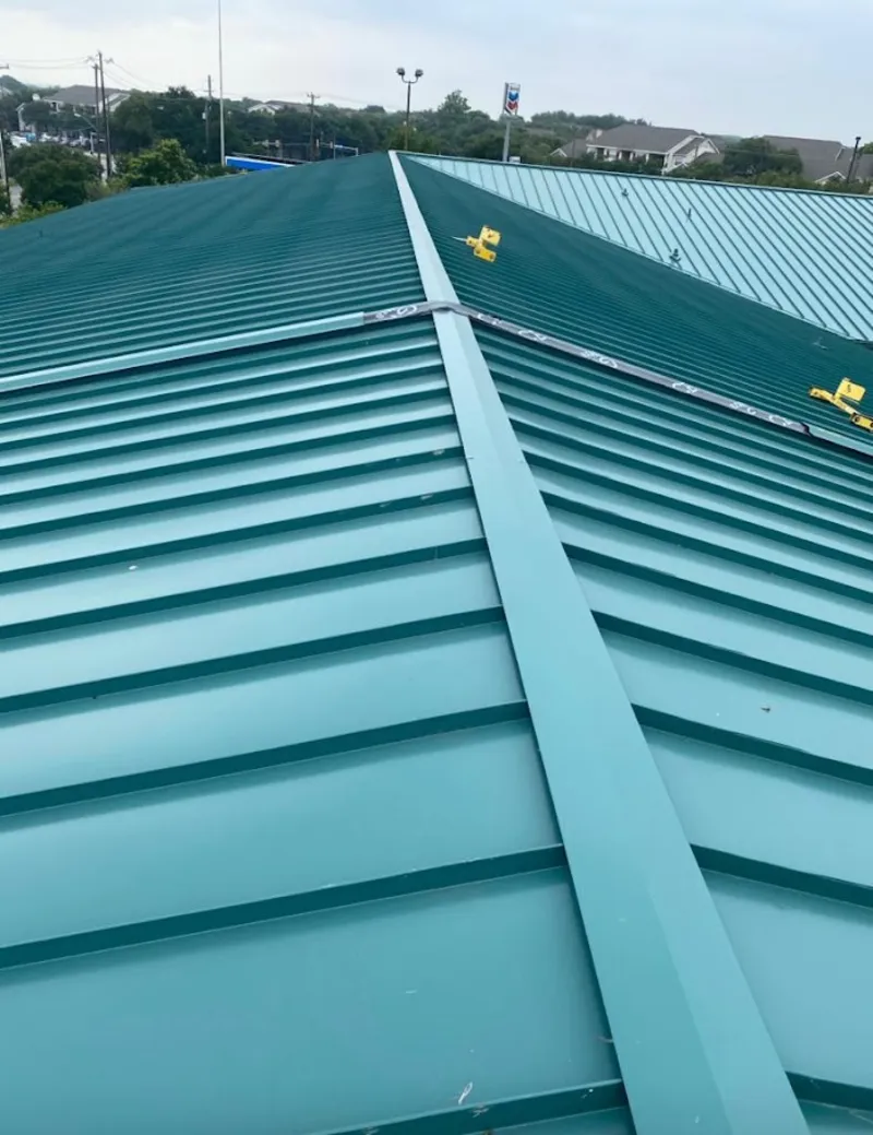 Green commercial metal roof ridge and valley for Metal Roof Repair in Brookfield